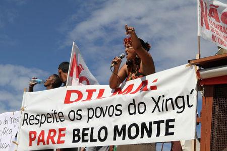 Photo: An opposition leader protests against Belo Monte. Credit: Christian Poirier/Amazon Watch