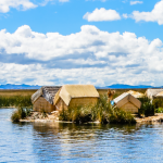 Traditional village on floating Uros  islands on lake Titicaca near city of Puno, Peru.