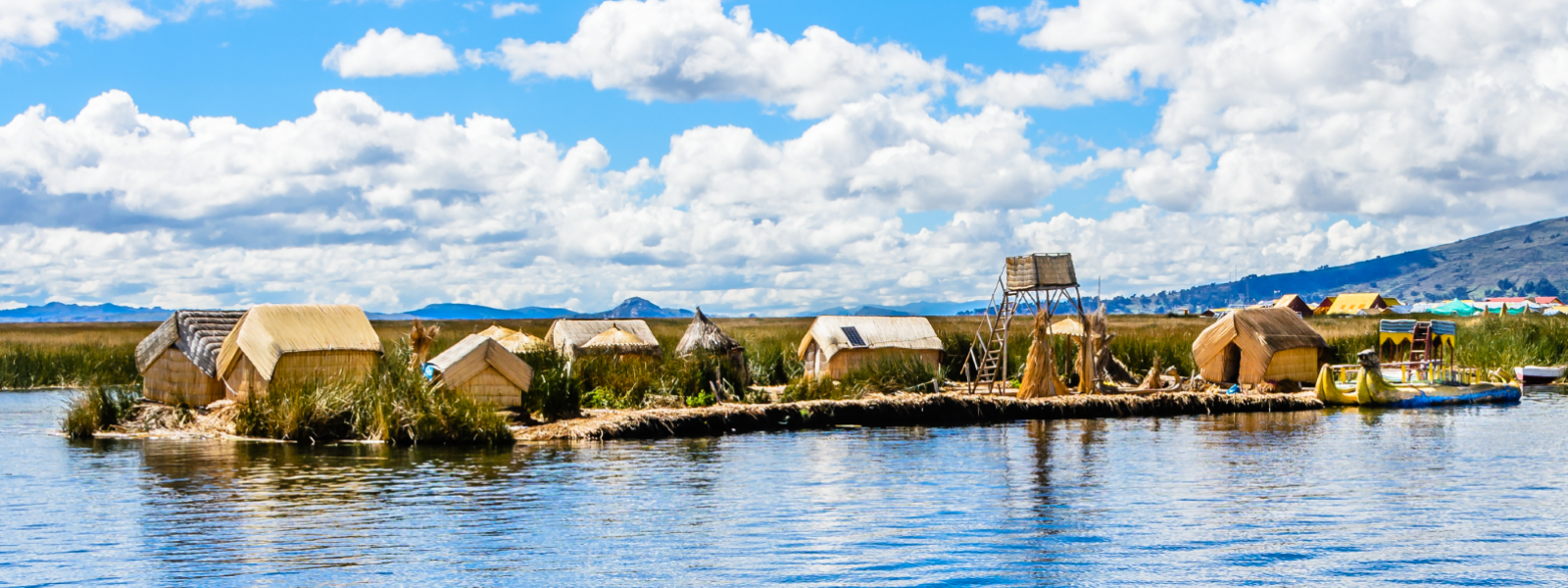 Traditional village on floating Uros  islands on lake Titicaca near city of Puno, Peru.