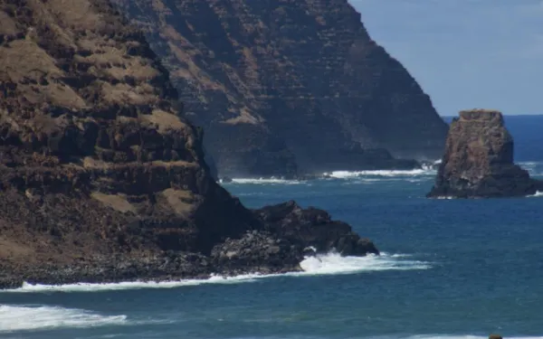 Cliff with easter island heads