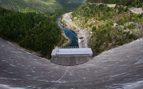 view of a large dam from atop the dam's wall