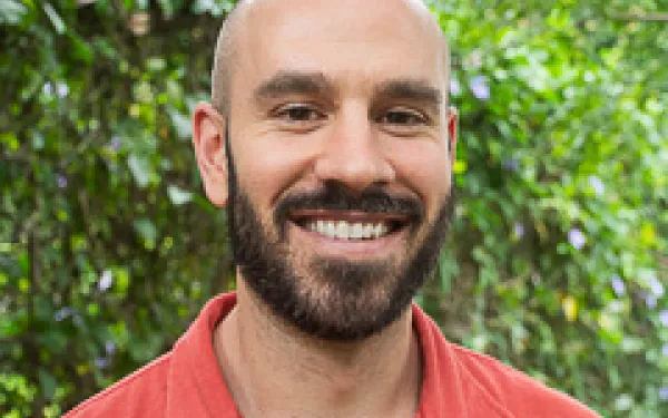 Headshot of Eli Wilkins-Malloy